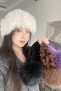 Cozy fluffy winter bucket hat for women, soft faux fur warm cap with trendy styling design.