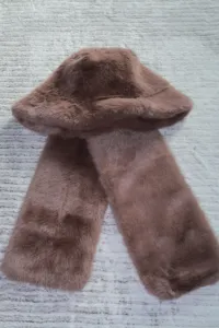 Brown plush faux fur bucket hat and scarf set detail, winter warm cozy fluffy fabric close up