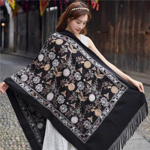 Detailed view of the autumn winter embroidered ethnic style cashmere feel tassel scarf shawl.