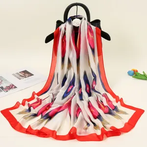 Xinjiang style satin silk scarf with vibrant abstract print, versatile long women accessory.