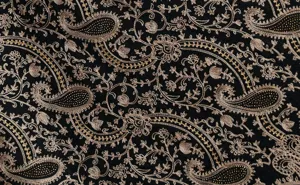 Detailed view of women's thick warm imitation cashmere scarf with exquisite paisley embroidery.