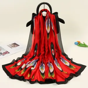 Xinjiang style silk satin long scarf with vibrant traditional ethnic print for women.
