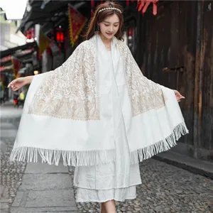 Women autumn winter warm imitation cashmere shawl with elegant paisley embroidery and fringe trim.