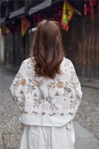 Detail view of ethnic floral embroidered cashmere feel winter warm shawl scarf for women.