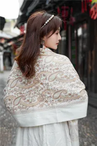 Detailed view of the embroidered paisley cashmere-feel winter warm shawl scarf in ethnic style.