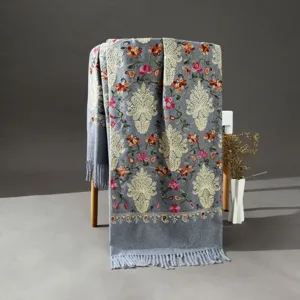 Gray embroidered cashmere feel shawl, ethnic floral paisley scarf with tassels, detailed view.