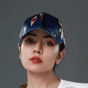 Close-up detail view of the traditional ethnic style printed silk baseball cap in deep blue.