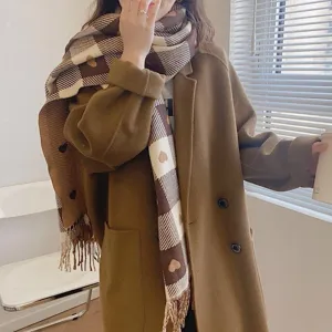 Cozy autumn and winter plaid cashmere-feel scarf detail, featuring cute heart patterns.