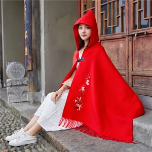 Ethnic style red hooded cape shawl with horn button and delicate floral embroidery for women.