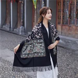 Detailed view of the autumn winter women ethnic embroidered cashmere feel tassel shawl scarf.
