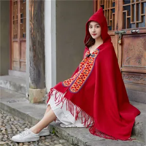 Ethnic hooded red cape shawl with fringe and embroidery, perfect for travel and daily wear.