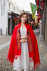 Red ethnic hooded cloak shawl with vintage embroidery and horn buttons for women.