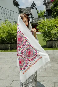 Ethnic style embroidered tassel shawl, white imitation cashmere scarf with colorful floral design.