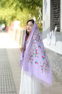 Elegant embroidered cashmere scarf for women, warm winter floral shawl, versatile ethnic style.