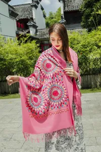 Women's pink imitation cashmere scarf with ethnic sunflower embroidery and cozy tassel hem.