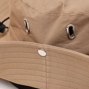 Quick-dry hiking bucket hat outdoor sun hat detail view with breathable metal eyelets.