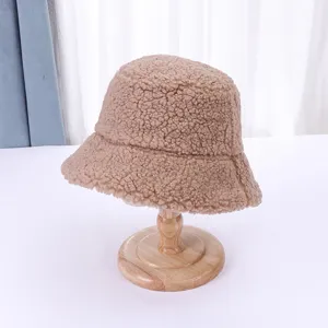 Detailed view of fluffy shearling bucket hat for women winter warm fuzzy plush fisherman cap