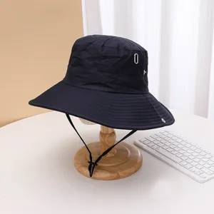Quick-dry bucket hat for outdoor hiking and camping with wide brim and adjustable chin strap.