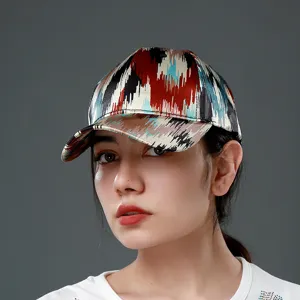 Detailed view of ethnic ikat patterned baseball cap featuring vibrant multi-color design.