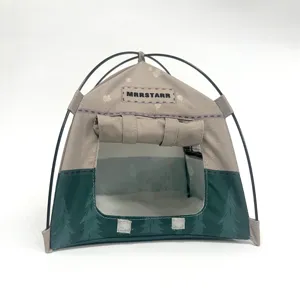 Miniature camping tent detail view, grey and green dollhouse photography prop display.