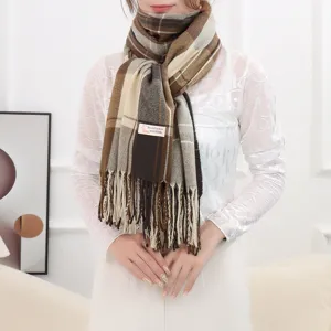 Cozy winter plaid cashmere blend scarf with elegant fringe detail for women warmth.