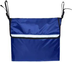 Detail view of blue wheelchair storage bag with hanging straps and reflective safety strip.