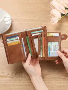 Detailed view of women trifold leather wallet interior with card slots and coin pocket.
