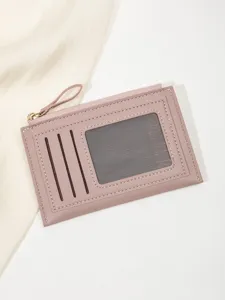 Minimalist women's short wallet detail, ultra-thin zipper card holder with multiple slots.