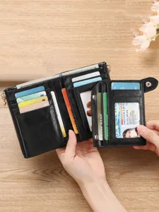 Women black leather tri-fold short wallet with multi card slots and double zipper coin pocket.
