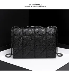 Black quilted chain shoulder bag, elegant cross body bag with metal strap and classic design.
