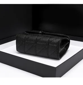 Black quilted chain bag detail view, luxury style PU leather texture, elegant metal lock.