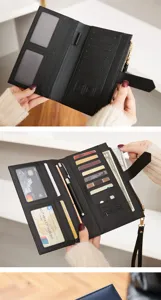 Détail du portefeuille de passeport noir multifonction avec fentes et porte-stylo.