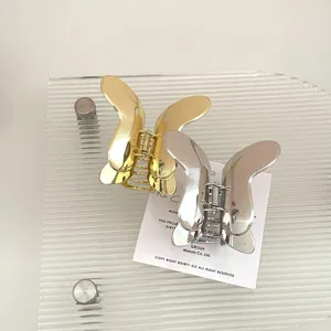 Eleganti mollette per capelli a farfalla in metallo oro e argento, accessori in stile francese chic.
