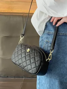 Classic black quilted crossbody bag for women, mini shoulder purse with elegant camellia decor