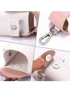 Portable two-tone mini golf ball pouch bag with metal hook and snap closure for sports use.