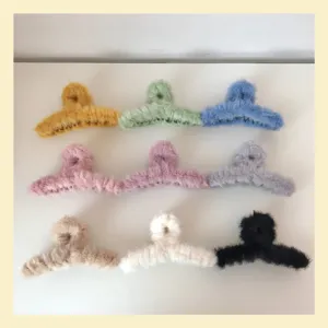 Details of cozy plush hair claw clips in multiple vibrant colors for daily elegant styling.