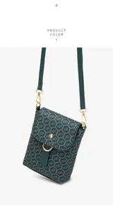 Detailed view of the vintage peacock green mini phone bag featuring retro print and gold hardware.