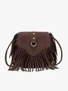 Close-up detail of dark brown suede crossbody bag featuring stylish fringe and gold-tone hardware.