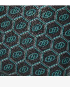 Peacock green mini phone bag detail, vintage hexagonal pattern crossbody bag style.