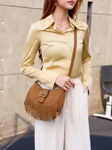 Vintage brown suede fringe saddle bag for women, chic casual crossbody shoulder bag.