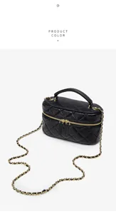 Detailed view of the black quilted vanity bag with luxury chain strap and gold hardware.