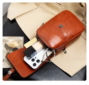Detail shot of the vintage PU leather crossbody bag, showing double-layer large capacity space.