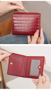 Close-up of the stylish women's bifold wallet showing interior card slots and texture.