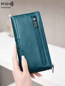 Dark green RFID blocking women long wallet with double zippers and multiple card slots.