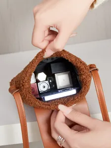 Cute vintage plush phone bag for women, stylish brown fluffy crossbody single shoulder bag.