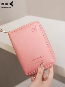 Pink RFID blocking travel wallet and passport holder, multi-functional card organizer bag.