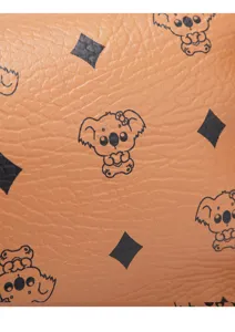 Brown leather shoulder bag featuring a cute koala and diamond repeating print design.