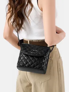 Classic black diamond quilted crossbody bag for women, stylish lightweight shoulder bag main view.