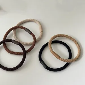 Minimalist basic hair ties set, durable elastic hair bands with chic connector detail for daily styling.