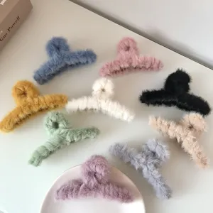 Fluffy faux rabbit fur hair claws in multiple vibrant colors, ideal for cozy autumn and winter styling.